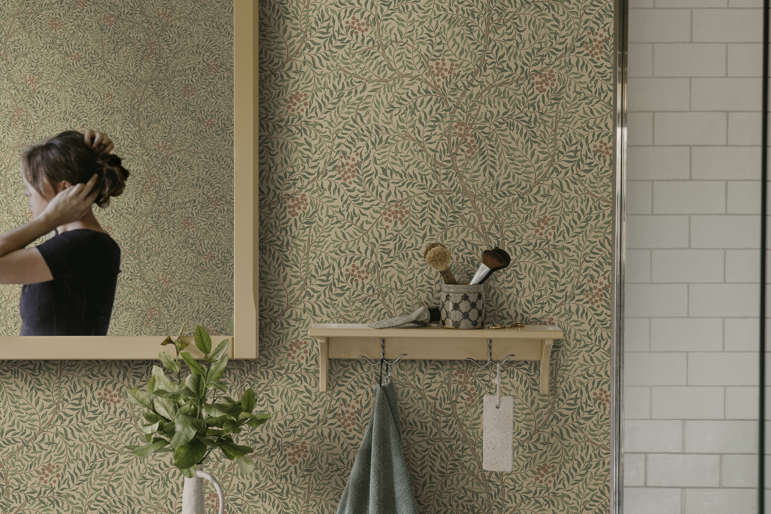 Simon botanical pattern cloakroom wallpaper in garden green