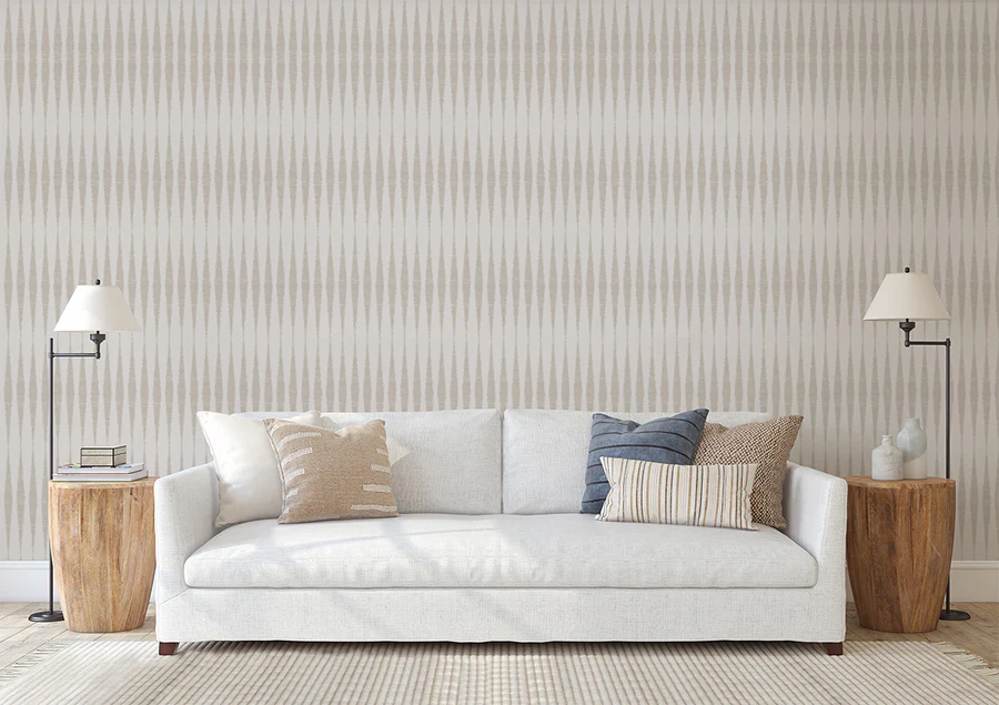 spindle craft wallpaper in living room with sofa decorated with white linen couch and wooden stools