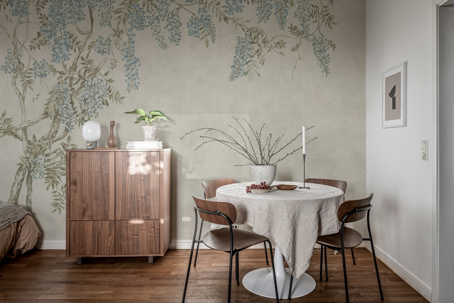 simple floral wallpaper living room with wisteria garden mural creating a calming atmosphere