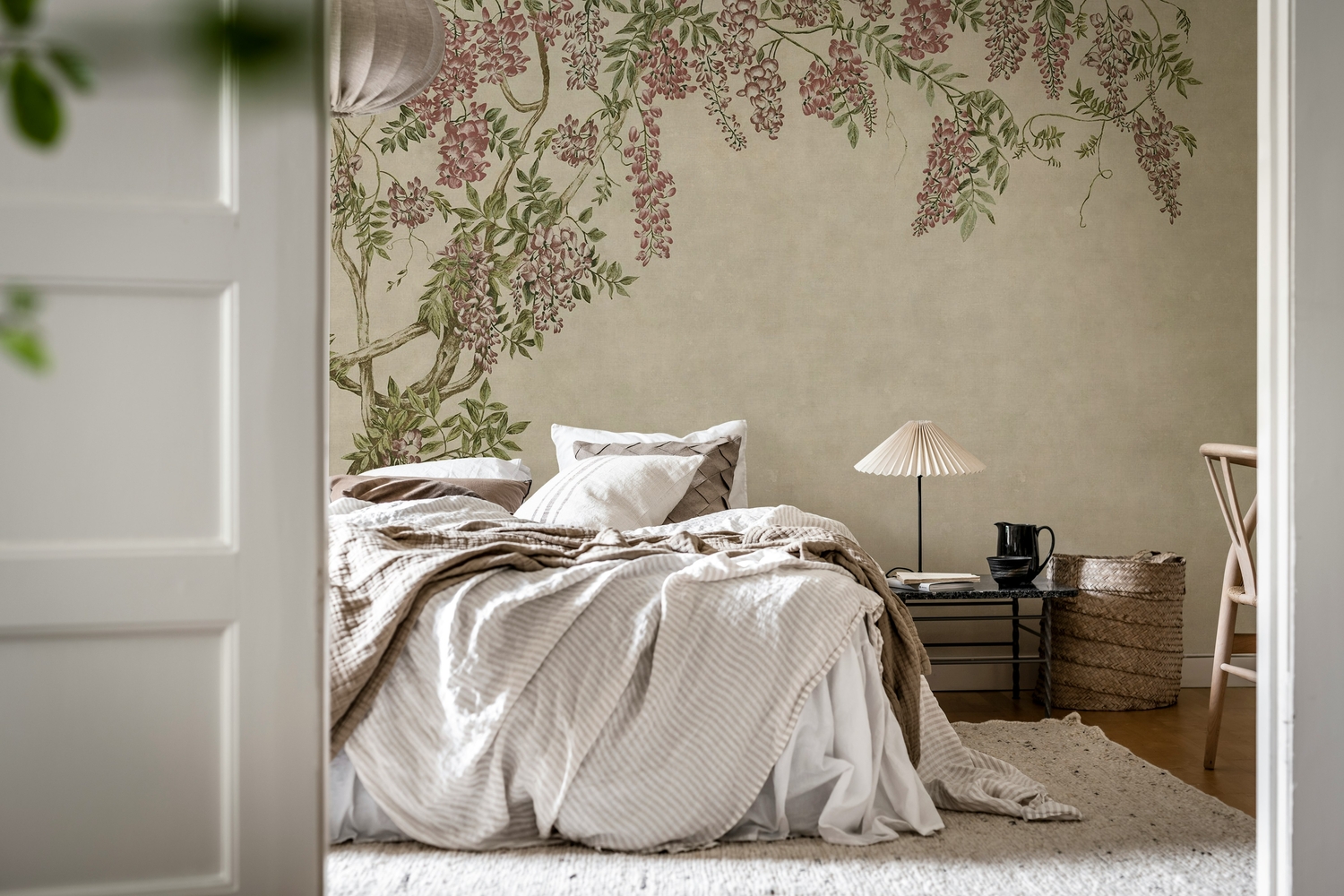 simple floral wallpaper bedroom with wisteria garden mural creating a peaceful and relaxing retreat