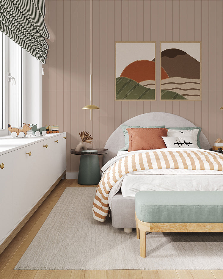 Beige striped wallpaper in a kids room with bed and pendant light