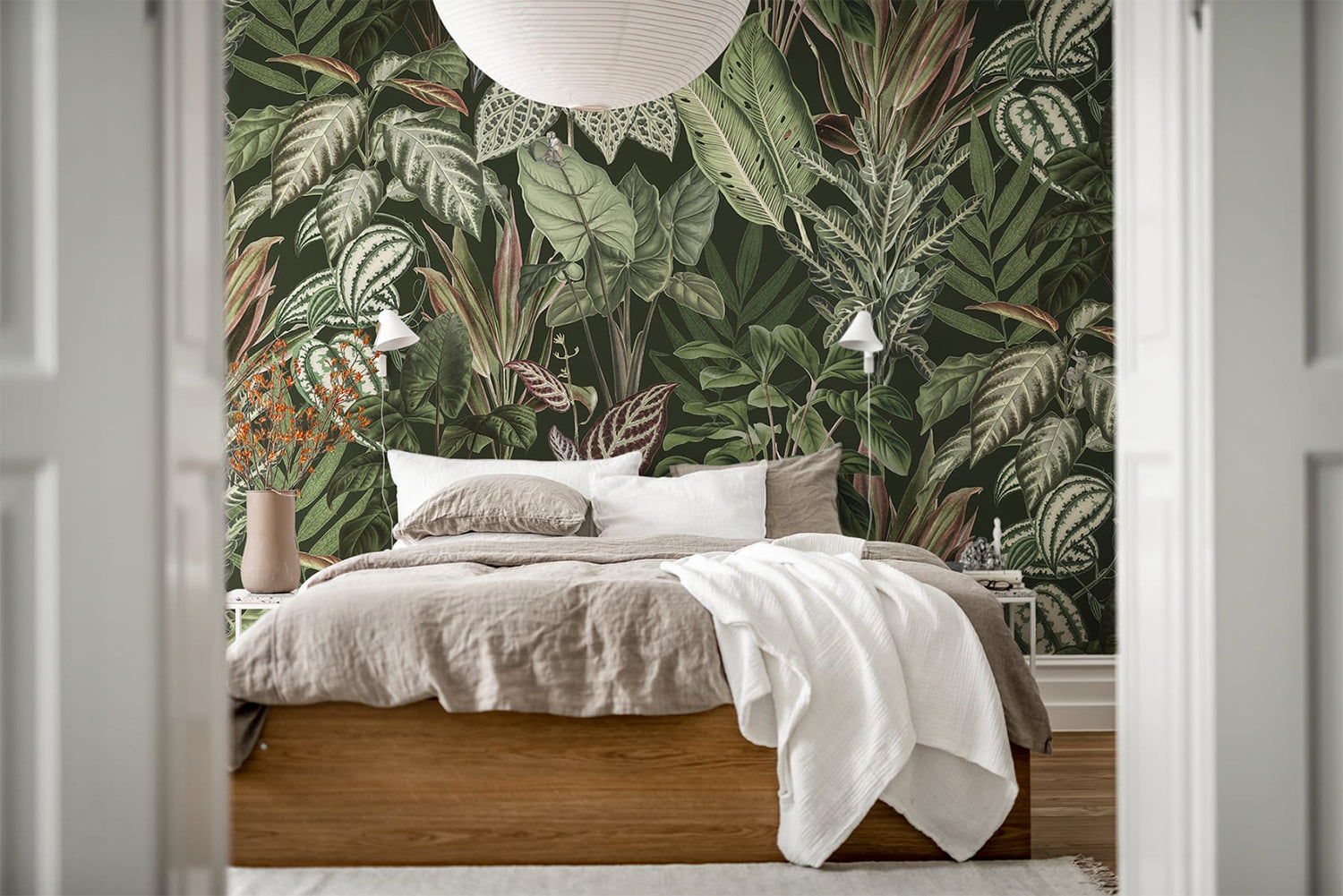 Night Time Jungle Tropical Mural Wallpaper in Dark Green in Bedroom with neutral bedding
