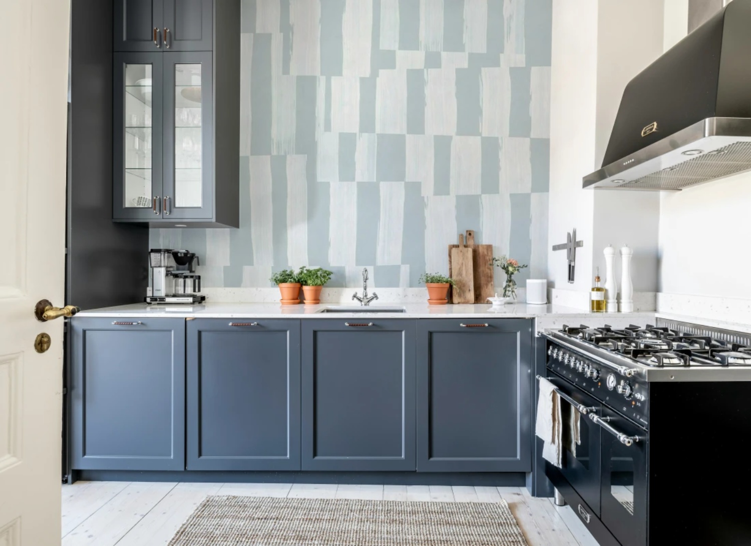 Blue striped wallpaper kitchen featuring Broken Stripes Abstract Pattern Wallpaper with soft blue tones and contemporary striped design