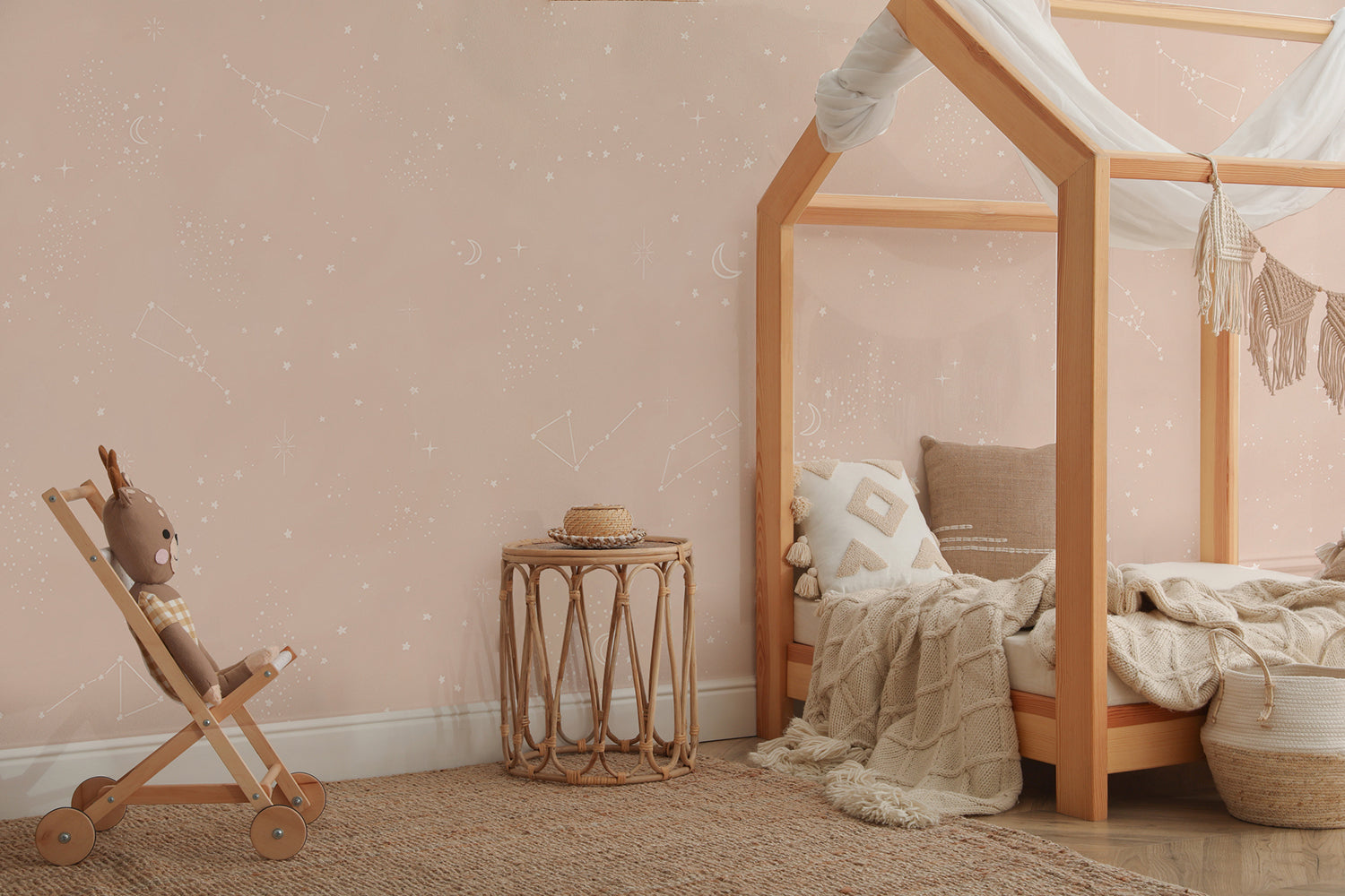 Chalky Stars, Pastel Pattern Wallpaper, toddler girl wallpaper featured in bedroom styled with natural wood furniture.