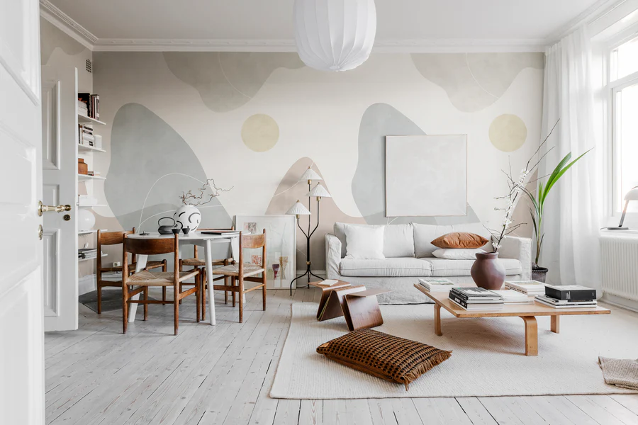 Terrain, Mural Wallpaper graces a cozy living area, where it complements a soft sofa set, dining table and rug, creating an inviting and comfortable atmosphere