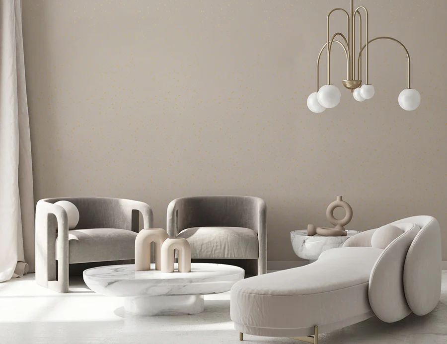 A stylish living room features modern furniture against a wall adorned with Gold Metallic Confetti Speckles, Pattern Wallpaper White