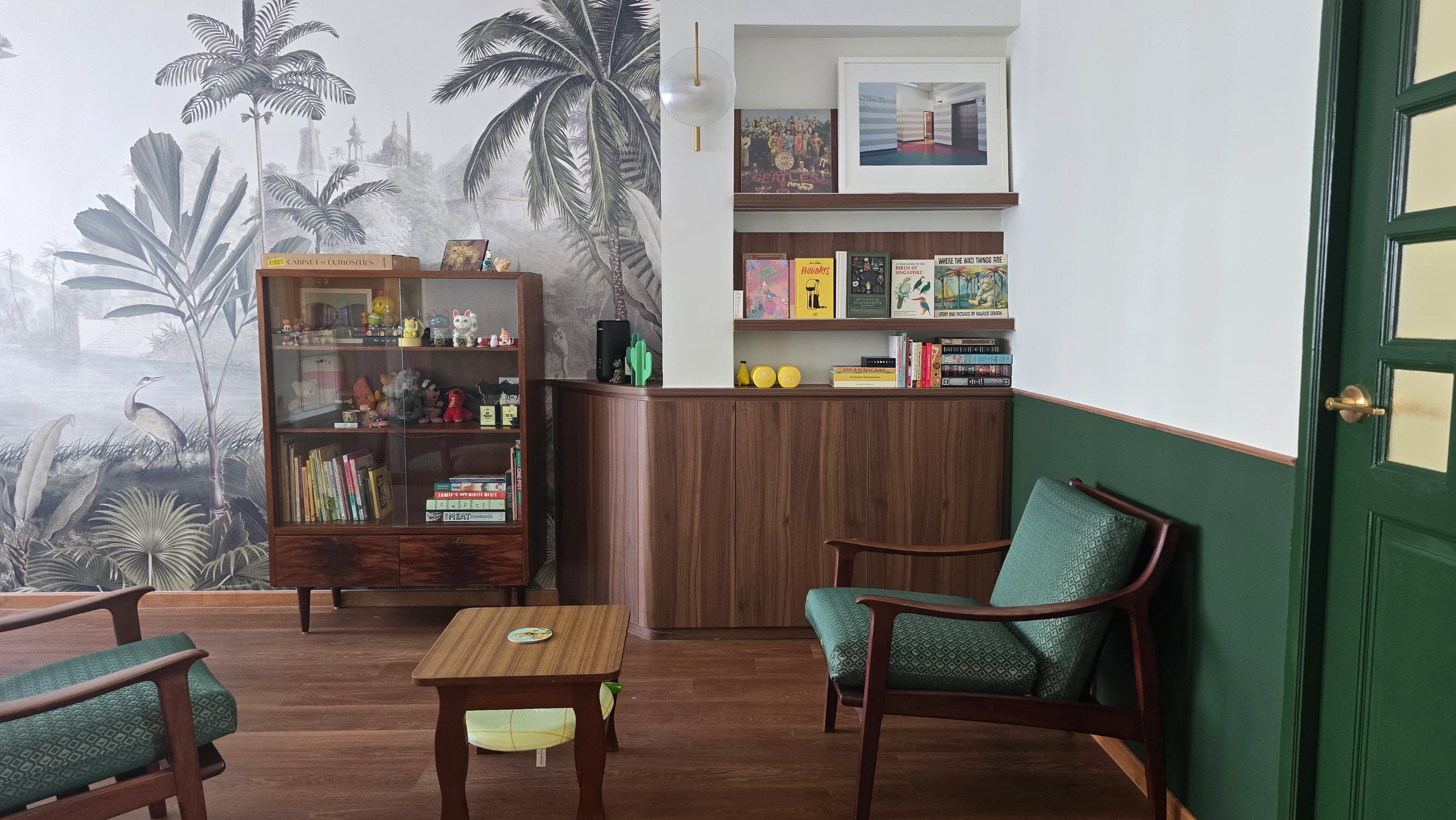 Leaopard landscape in a living room with wooden chairs and shelves